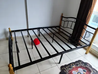 Bed & mattress - Metal double bed frame with wooden finials - good condition ( mattress free)