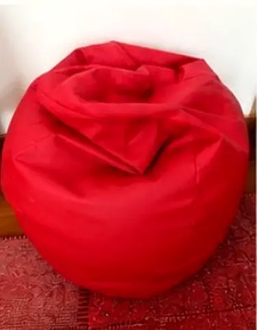Red leather-look bean bag chair - good condition