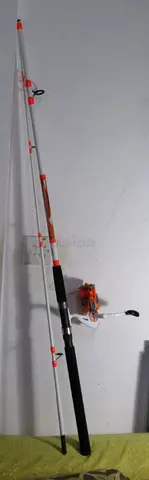 BEAUTIFUL OKURA 2.4M CARBON JIGGING ROD AND OKURA 5000 FISHING REEL-NO OFFERS THANKS