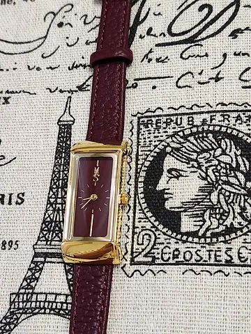 Women's rectangular gold-tone dress watch with burgundy leather strap