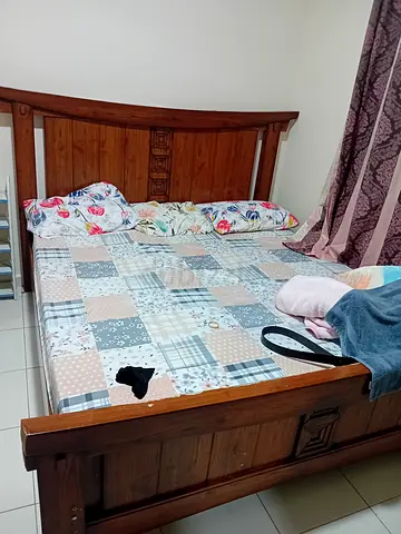 Solid wood double bed frame with headboard and storage