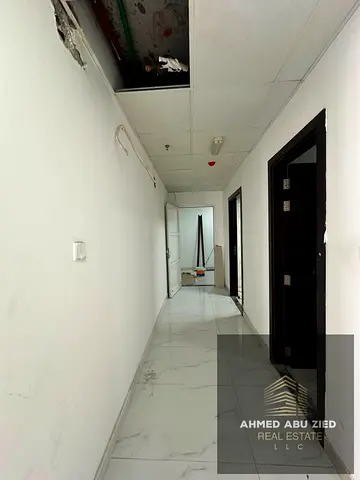 Spacious Commercial Office for Rent in Al Rashidiya 2 | 2 Offices + Open Space | AED 56K