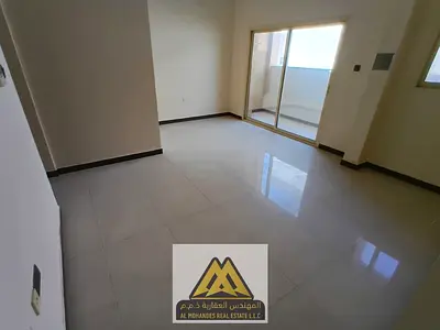 A two-bedroom apartment with a living room in a prime location in Al Jurf 3; close to amenities and