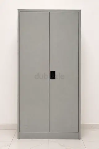 Tall grey metal storage cabinet with double doors — good condition