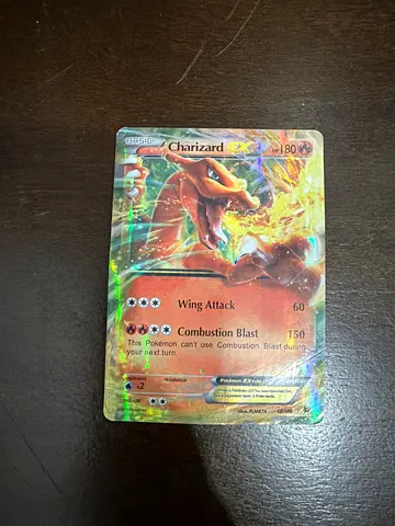Basic charizard ex with minor dent