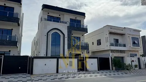 Luxury villa for sale in Al Bahia | 5 master bedrooms | Two floors and a roof | Includes registration and ownership fees, freehold