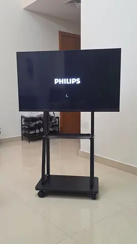 Philips 40-50 inch LED TV on mobile stand - good working condition
