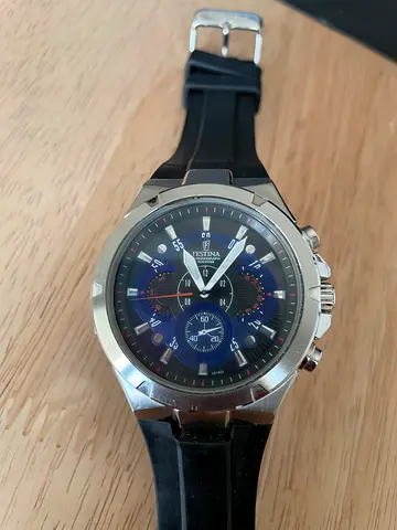 Men's stainless steel chronograph watch with black rubber strap
