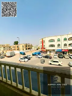 Spacious 2BR in Al Rawda 2, 2 baths, 2 balconies, cheque deposit, family-friendly, prime location ne