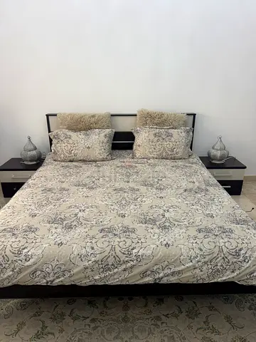King bed with side table and mattress
