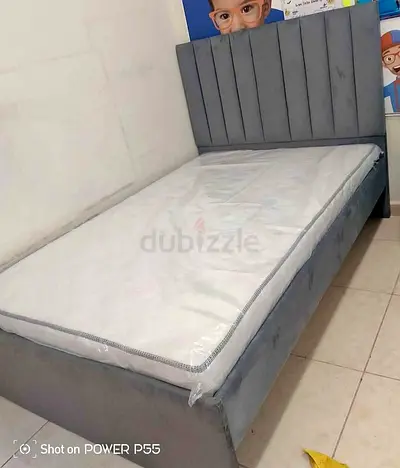 Double bed 120cmx190cm grey upholstered bed frame with mattress - good condition