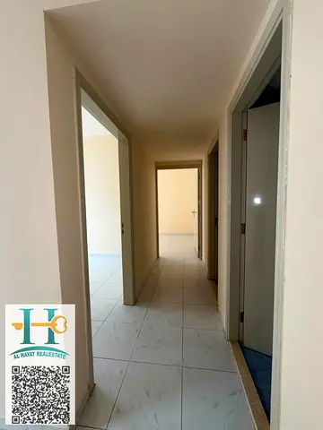 Two bedrooms, a living room, 2 bathrooms, and 2 balconies; located in Al Jurf, opposite Ajman Court