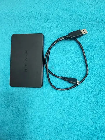 500GB external hard drive with USB cable.