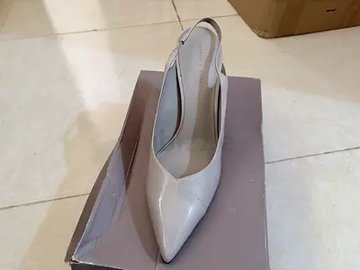 Light grey patent leather slingback pointed heels