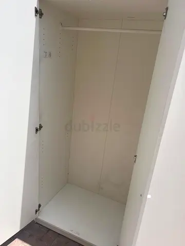 White single-door wardrobe / armoire in good condition