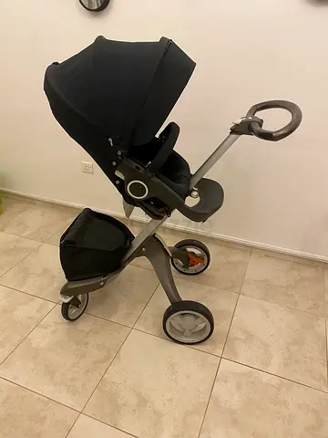 Lightweight modern pram stroller with canopy and storage basket