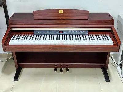 The Yamaha Clavinova CLP-230M is an 88-key digital home piano featuring a matte mahogany ("M" design