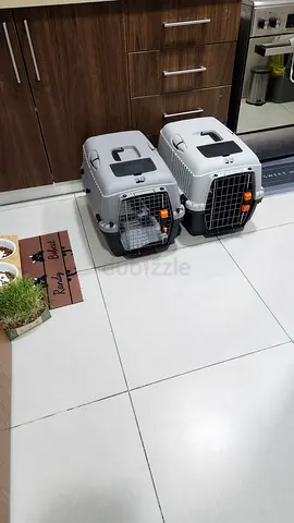 Two hard-sided pet carriers (medium) - good condition