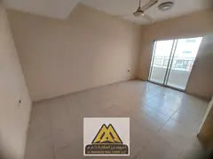 Large 2BR with separate living room in Al Nuaimiya 2, 2 baths, balcony, central AC, free maintenance