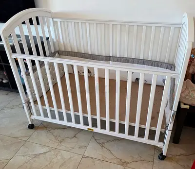 White Wooden Baby Crib - Standard Size, Juniors brand, Good Condition.