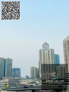 2BR hall in Al Rashidiya 1 near Gulf Bridge with balcony and 2 bathrooms; yearly rent AED 34,000 wit