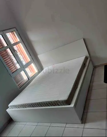 Ikea king size bed with mattress and storage drawers