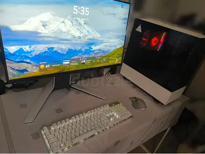 White gaming desktop PC with monitor, mechanical keyboard and mouse - ready setup