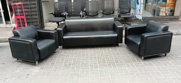 Black leather 3-seater sofa with two matching armchairs - good condition