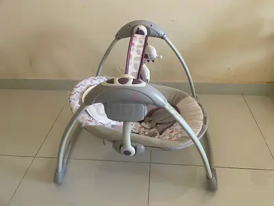Baby electric swing/bouncer in good condition-Juniors brand