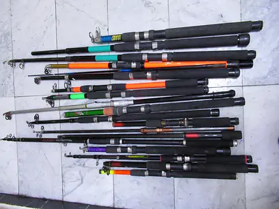 BOX OF TELESCOPIC FISHING RODS FOR REPAIR AND PARTS