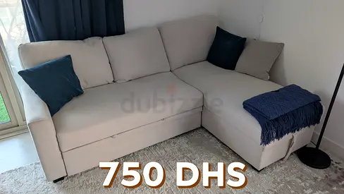 Light grey L-shaped corner sleep sofa with storage — good condition