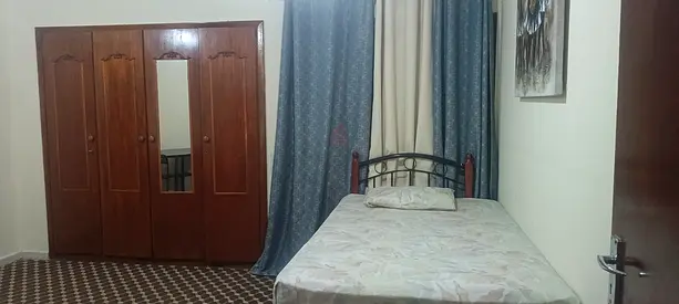 furnished room with attched bath