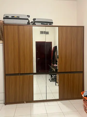 Spacious and stylish 6-door wardrobe In excellent condition