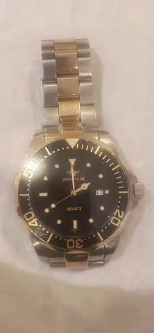 Two-tone vintage Swiss made men's quartz dive-style wristwatch with date window