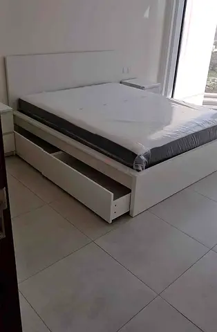 Ikea king size bed with mattress and storage drawers