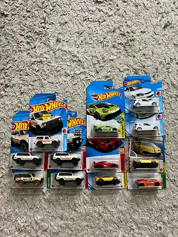 Lot of 14 Hot Wheels die-cast cars — new in packaging