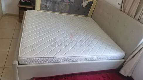 Low-profile upholstered bed frame with storage drawers (single/queen base) and mattress