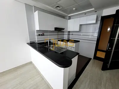 Spacious 1bhk with open kitchen gym pool parking free