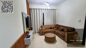 Furnished 1BR hall in Garden City Al Hamidiya with balcony and excellent space; yearly rent AED 30,0