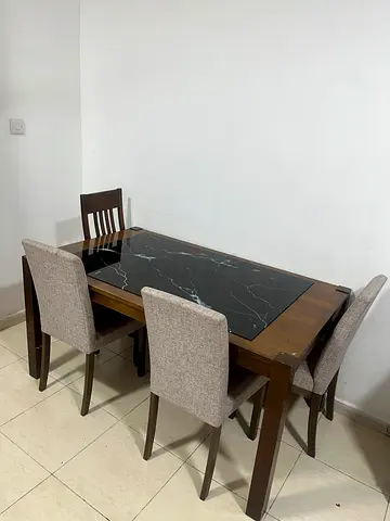 Wooden 6-Seater Dining Table with Glass Top and Upholstered Chairs