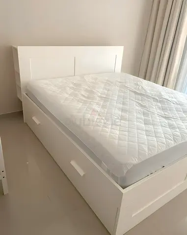 Ikea brimness King storage bed with IKEA mattress - like new