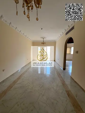 غرفة وصالة للإيجار في الجرف 2 | 2 حمام وبلكونة | تكييف مركزي وصيانة مجانية | 35,000 درهم