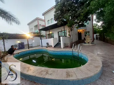 Swimming pool/ Spacious 5 bedroom double story villa / close to heera beach al riffah area
