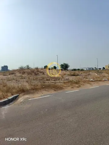 4 adjacent residential plots in Al-Zubair Gardens in a very prime location for building a villa, gr