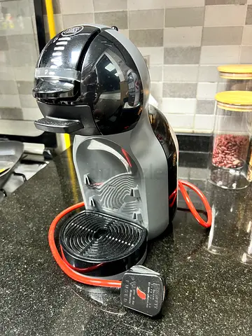 Used single-serve capsule coffee machine - compact and working