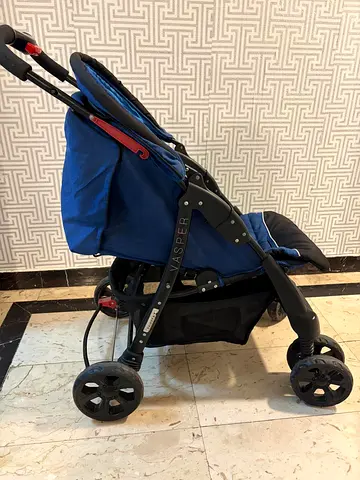 Lightweight blue baby stroller in good used condition