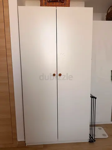 White 2-door wardrobe / armoire in good condition