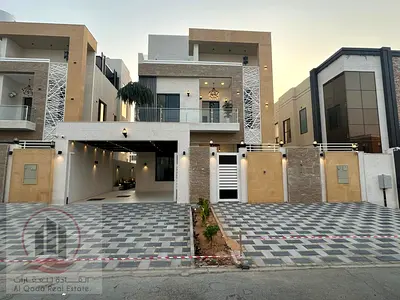 For sale, a villa in Ajman Al Helio, 5 master rooms, a Majles room, a hall, and a maid’s room, free