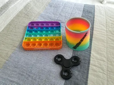 Fidget + Slinky + Pop-it