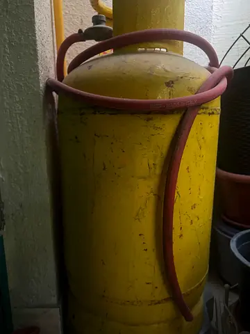 Gas bottle with regulator and pipe